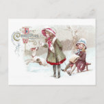 Sled Vintage Christmasの犬と少女 シーズンポストカード<br><div class="desc">1912走年からヴィンテージのクリスマスポストカードに入った小さなスレッドで他の女の子を引っ張っている2人の女の子の横にある犬。</div>