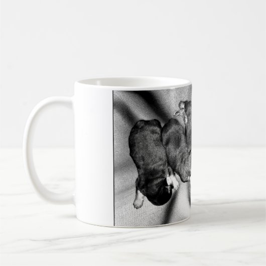 sleepyheadのロットワイラーの子犬 コーヒーマグカップ (左)
