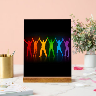 SlipperyJoeのグループの人々が手を握ってLを形成 アクリルサイン