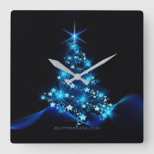 SlipperyJoeのスタイライズされた輝くクリスマスツリーの群れ スクエア壁時計 (正面)