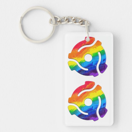 SlipperyJoeのプラスチック45 RPMレコードアダプタ振動 キーホルダー (正面)