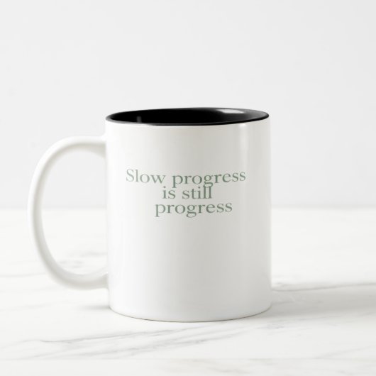 Slow Progress Is Still Progress ツートーンマグカップ (左)
