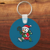 Snowman Santa Hat Playing Lacrosse Christmas Playe キーホルダー (正面)