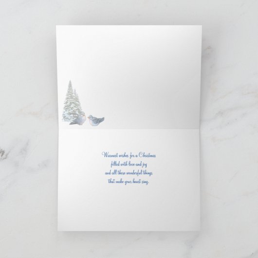 Snowyの木でさえずっているクリスマスのブルーバード シーズンカード (内部)