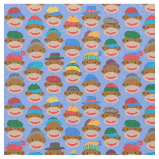 Sock Monkey Heads with caps on Blue Fabric ファブリック (クローズアップ)