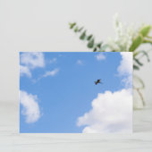 Solitary Bird Soaring Through Bright Blue Sky with 招待状 (スタンド正面)