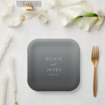 Sophisticated Gray Minimalist Wedding ペーパープレート<br><div class="desc">This elegant wedding plate features a minimalist design with a gradient gray background that transitions from light to dark. The layout is centered, showcasing bold, uppercase names in a clean sans-serif font, complemented by a stylish cursive "and" for added sophistication. Below the names, the date is presented in a lighter...</div>