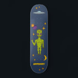 Space Alien with Flying Saucer Personalized スケートボード<br><div class="desc">Create an out-of-this-world personalized gift. This skateboard deck features illustrations of a lime green space alien,  a ufo or flying saucer,  stars,  a moon and planets and is ready to be personalized with a name.</div>