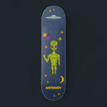 Space Alien with Flying Saucer Personalized スケートボード<br><div class="desc">Create an out-of-this-world personalized gift. This skateboard deck features illustrations of a lime green space alien,  a ufo or flying saucer,  stars,  a moon and planets and is ready to be personalized with a name.</div>