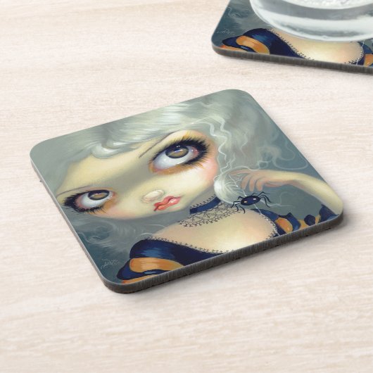 "Spiderling"のコースターが付いているポートレート コースター (左側)