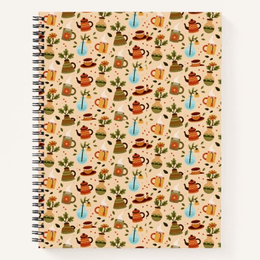 Spiral notebook with a vibrant cover featuring  ノートブック (正面)