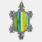 SPWWタングエッドティール(緑がかった色)グリーンとオレンジ スノーフレークピューターオーナメント (左)