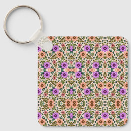 Square keychain showcasing a vibrant floral  キーホルダー