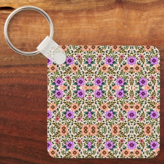 Square keychain showcasing a vibrant floral  キーホルダー (正面)