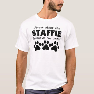 Staffieについて用心します所有者の忘れて下さい Tシャツ