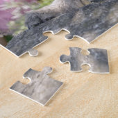 Standard Schnauzer puppy in a flowering garden ジグソーパズル (側面)