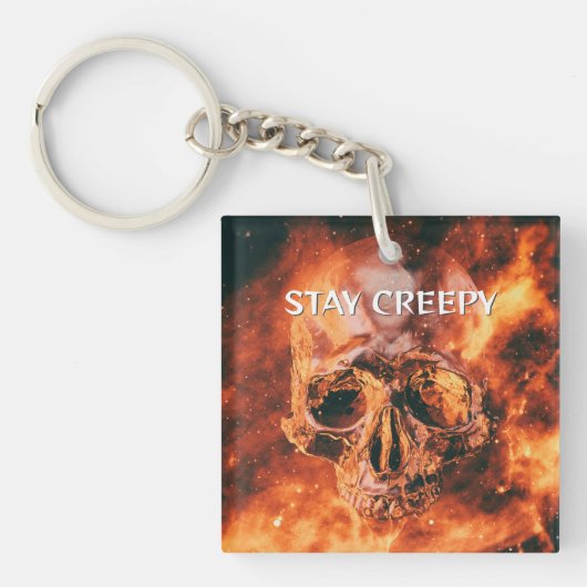 Stay Creepy. Flaming skull in space キーホルダー (正面)