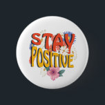 Stay Positive – Floral Motivational  缶バッジ<br><div class="desc">Brighten your day with this uplifting design! The bold phrase STAY POSITIVE is highlighted with vibrant colors and surrounded by cheerful floral elements,  making it a perfect reminder to embrace optimism and good vibes. Ideal for casual wear,  workouts,  or as a thoughtful gift to inspire positivity.</div>