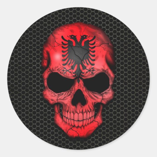 Steel Meshグラフィック上のアルバニアフラグスカル ラウンドシール (正面)