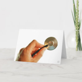 Stethoscoop in een hand voor een ziekenhuis sfeer. サンキューカード