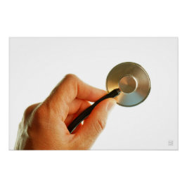 Stethoscoop in een hand voor een ziekenhuis sfeer. ポスター