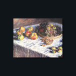 Still Life with Apple and Grues by Claude Monet キャンバスプリント<br><div class="desc">Still Life with Apple and Grues (1880) by Claude Monetはヴィンテージの印象派のアート素晴らし・スチル・ライフ絵画ズだ。感謝のディナーにセットされたリンゴとブドウを含むテーブルの上のバスケットの様々な果物。アーティストについて：クロード・モネ(1840-1926)は印象派の運動の創始者であフランスのり絵画、その絵画の大部分は「空中に浮かぶ」（野外に浮かぶ）スタイル印象派の風景である。</div>