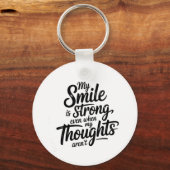 Strong Smile, Quiet Struggle キーホルダー (正面)