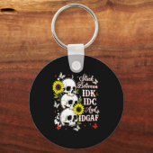 Stuck Between Idk, I And Idgaf Sunflower Skull Sar キーホルダー (正面)
