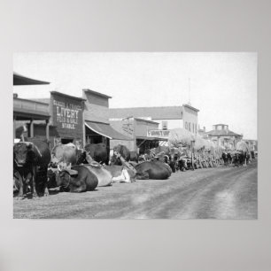 Sturgisの写真のメイン・ストリートに沿うウシのチーム ポスター