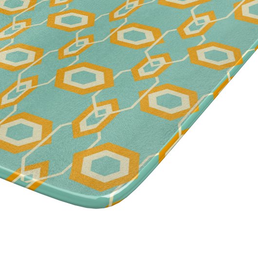 Stylized geometric pattern in bold orange hexagon カッティングボード (角)
