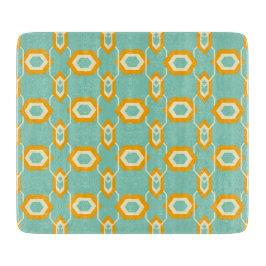 Stylized geometric pattern in bold orange hexagon カッティングボード