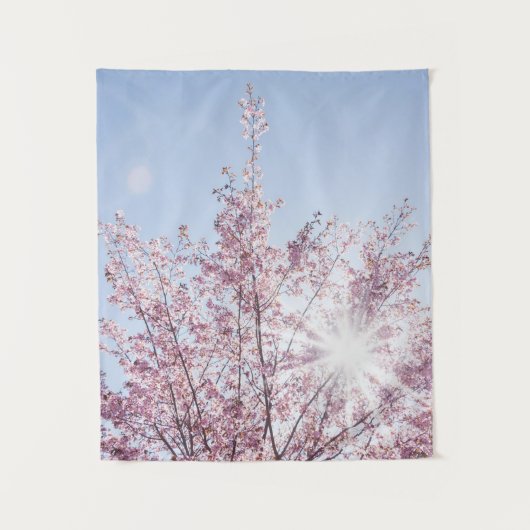 sun rays pass through pink flowers of a wow tree タペストリー (正面)
