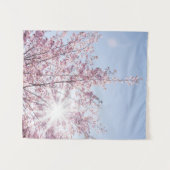 sun rays pass through pink flowers of a wow tree タペストリー (正面(横))