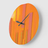 sunsets over a cyberpunk futuristic city ラージ壁時計 (傾斜)