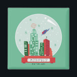 Superman Metropolis Snow Globe Graphic マグネット<br><div class="desc">Celebrate the holidays with this cute Metropolis snow globe,  featuring Superman flying past the Daily Planet!</div>