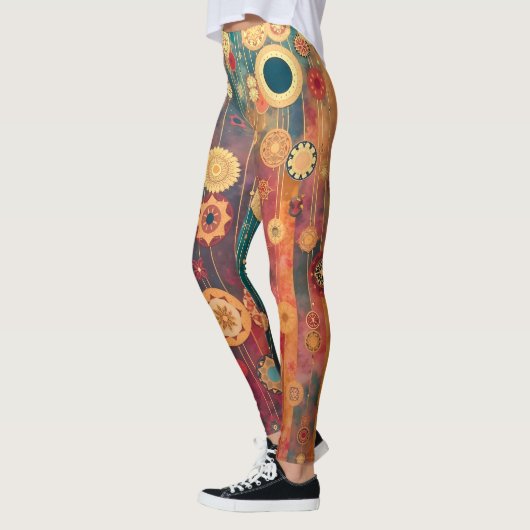 Suspended Gold レギンス (左)