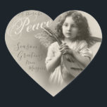 Sweet Christmas peace angel CC1072アンティーク写真 ハートシール<br><div class="desc">ハートインスパイアステッカーは、アンティークの写真と翼とマンドリンと甘い小さな女の子。彼女の表情は少し真面目なので、彼女に「明るい」メリーや「明るい」と言わせるのではなく、考え私は平和のメッセンジャーかもしれない。平和なクリスマス与えの私たち賛美を望む天使。フォントは、古い写真でよく見られる非公式の手書きメモを思い出すために選択されている。サンプルの文字を上書きするだけで、ステッカーをパーソナライズする。カスタマイズの詳細クリックはボタンを使用して、デザインエディタを使用する。</div>