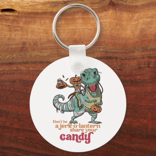 Tレックスパンプキンハロウィンおもしろいパンを嫌う キーホルダー (正面)