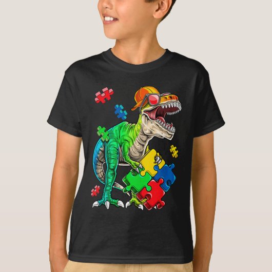 Tレックス恐竜の自閉症意識パズル作品のギフト Tシャツ (正面)
