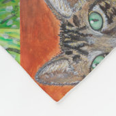 Tabby cat looking curious in grass fleece blanket  フリースブランケット (角)