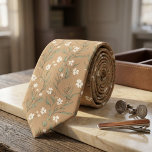 Tan Wildflower Delicate White Blossom & Leaves ネクタイ<br><div class="desc">Bring gentle, timeless romance to your wardrobe with this exquisite tan necktie blooming with delicate wildflowers! A graceful scatter of petite white blossoms, soft green leaves, slender stems, and subtle foliage creates a light, airy botanical pattern across a warm, earthy beige-tan background, evoking peaceful meadows and vintage pressed-flower elegance. This...</div>