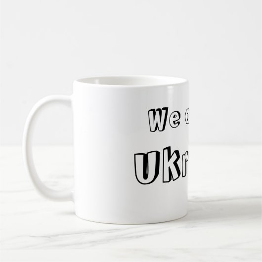 Taza We are all Ukraine コーヒーマグカップ (左)
