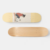 Teenager sitting on skateboard and next to his cat スケートボード (横)