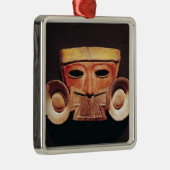 Teotihuacanからの人間のマスク、 メタルオーナメント (右)