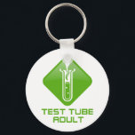 Test Tube Adult キーホルダー<br><div class="desc">We always hear about "test tube babies",  but whatever happens to them when they get older,  and leave their liquidy womb behind them?  Now,  with this fine product,  you can proudly declare yourself to be a "Test Tube Adult" - whether it's true,  or (most likely) not!</div>