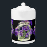 Thank You Lord (Purple Pansies)ティーポット<br><div class="desc">アクリルのプリント画像を使用した素敵なデザインのテ絵を描ーポット。結晶絵を描の瓶の中に素敵なパンジーがある。水晶の瓶の上に、ことわざによって栄光与えのすべての神の言葉がある、"ありがとう主よ。</div>