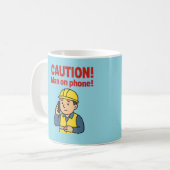 The 'CAUTION! Man on Phone!' mug コーヒーマグカップ (正面左)