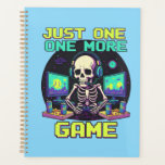 The Eternal Gamer プランナー手帳<br><div class="desc">Perfect for the dedicated gamer who can't resist one more round. Featuring a cool skeleton setup,  this design captures the ultimate gaming addiction in a fun,  retro style. A must-have for every PC and console enthusiast!</div>