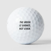 'The green is earned, not given' motivational ゴルフボール (正面)