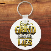 The Grind Never Lies Gold Motivational Design キーホルダー (正面)
